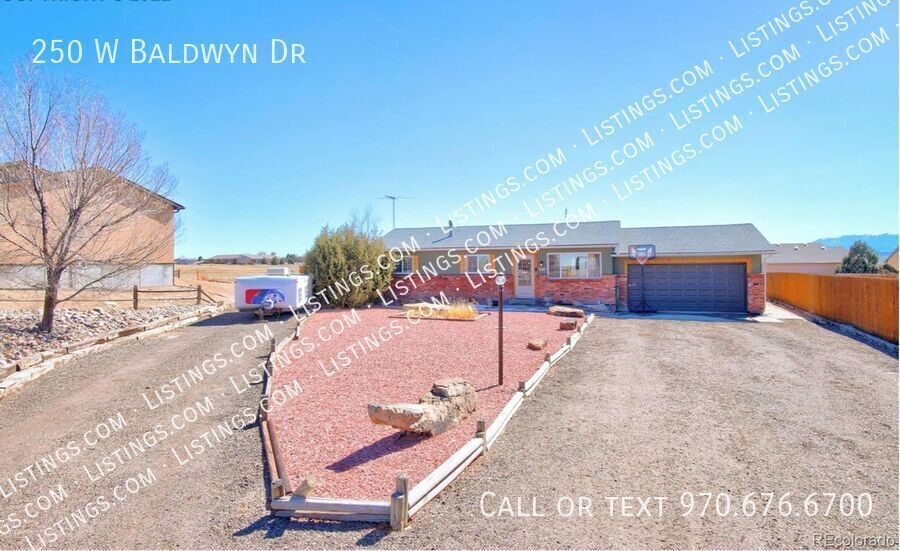 250 W Baldwyn Dr in Pueblo West, CO - Building Photo
