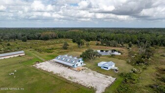 234 Cracker Swamp Dirt Rd in East Palatka, FL - Building Photo