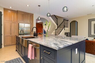 7703 Martino Cir in Naples, FL - Building Photo - Building Photo