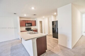 2352 SE Surrey Pl in Port St. Lucie, FL - Building Photo - Building Photo