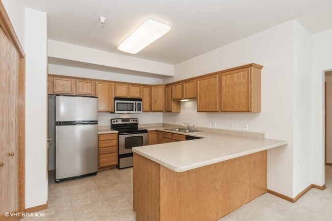 60 E Jefferson St, Unit 1 in North Liberty, IA - Building Photo - Building Photo