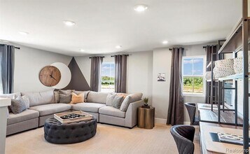 59579 Schuss Gully Dr in New Hudson, MI - Building Photo - Building Photo