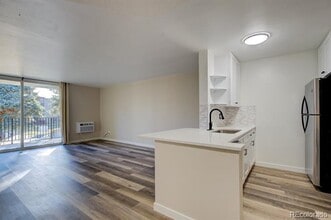 2231 S Vaughn Way in Aurora, CO - Building Photo - Building Photo