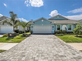 21900 Milan Villas Ln in Estero, FL - Building Photo