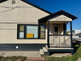 6895 Monaco St in Commerce City, CO - Building Photo