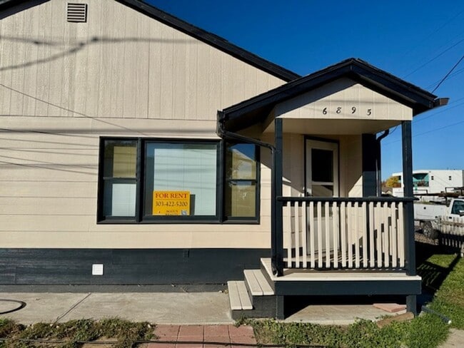 property at 6895 Monaco St