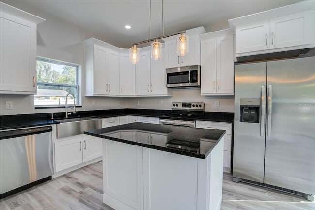 5630 Queener Ave in Port Richey, FL - Foto de edificio - Building Photo