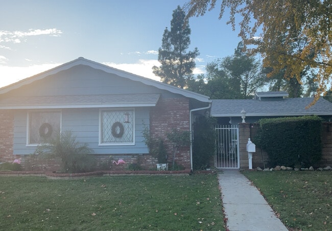 property at 10927 Woodley Ave