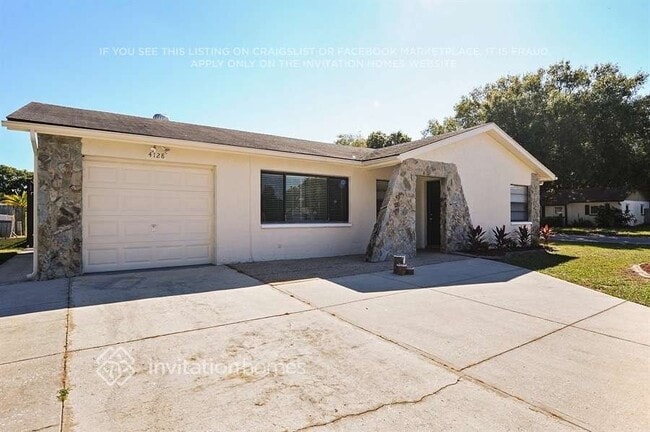 4128 Gray Squirrel Ln, Unit 1-408 in New Port Richey, FL - Foto de edificio - Building Photo