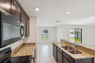 1975 Piedmont Ct in Mascotte, FL - Building Photo - Building Photo