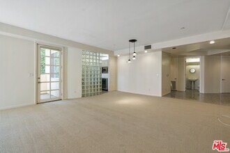 1875 S Beverly Glen Blvd-Unit -201 in Los Angeles, CA - Building Photo - Building Photo