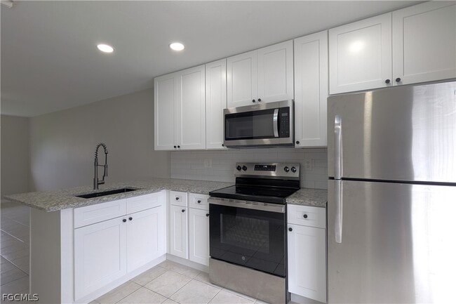 property at 427 NE Pine Island Ln