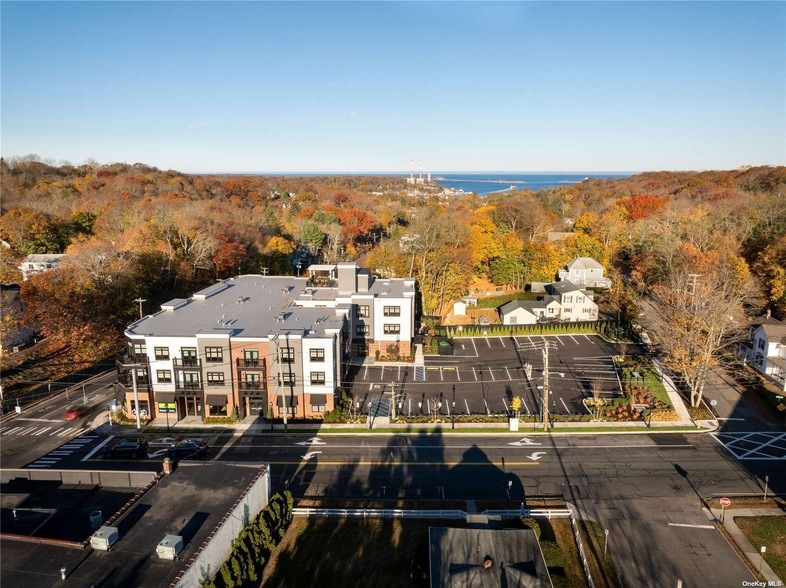 1 N Country Rd, Unit 107 in Port Jefferson, NY - Building Photo