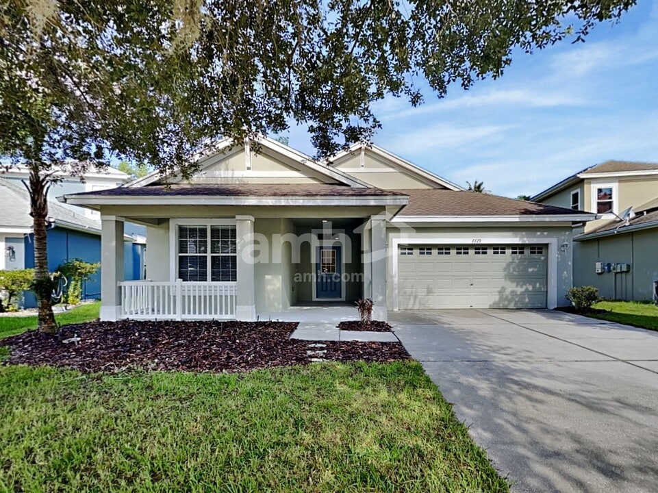 7729 Grasmere Dr in Land O Lakes, FL - Building Photo