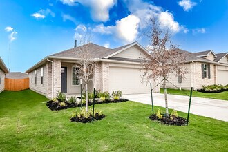 490 Evergreen Sumac Loop in Mustang Ridge, TX - Building Photo - Building Photo