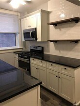 6440 Alamo Ave-Unit -1E in Clayton, MO - Building Photo - Building Photo