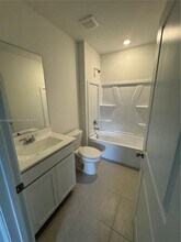 5837 NW Sweetwood Dr in Port St. Lucie, FL - Building Photo - Building Photo