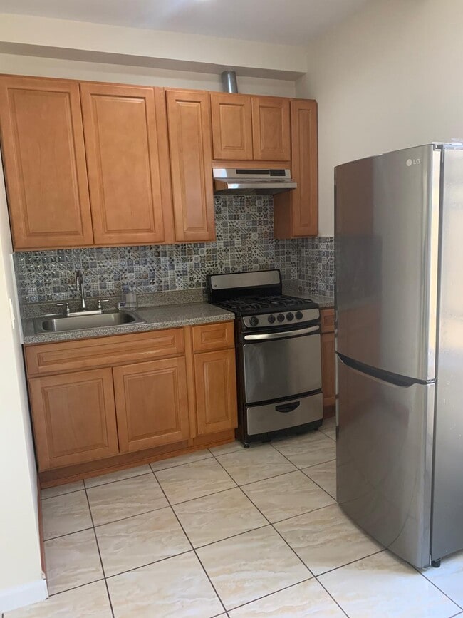 property at 32-24-32 82nd St