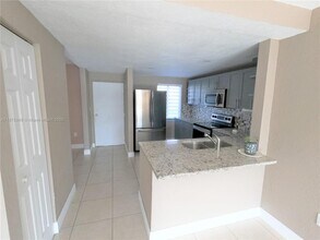 9911 W Okeechobee Rd in Hialeah, FL - Building Photo - Building Photo