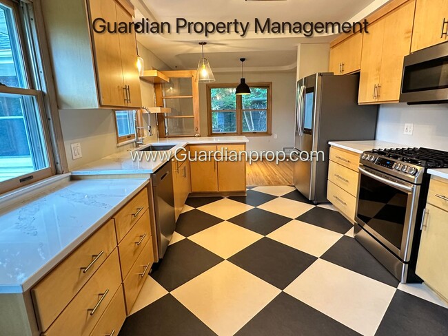 property at 6125 Elliot Ave