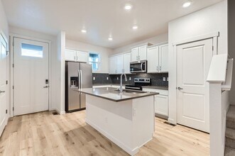 1348 S Boston Ct in Denver, CO - Building Photo - Building Photo