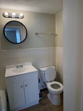 302 S Independence St, Unit I in Harrisonville, MO - Building Photo - Building Photo
