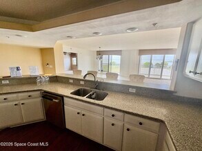 8934 Puerto Del Rio Dr in Cape Canaveral, FL - Building Photo - Building Photo