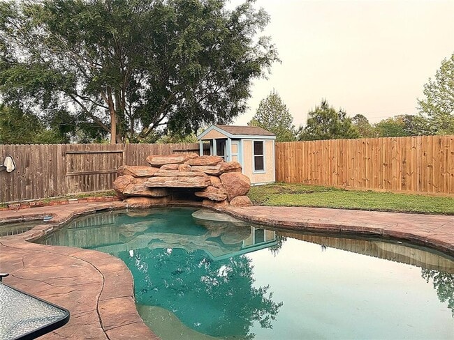 property at 7710 Misty Fern Ct