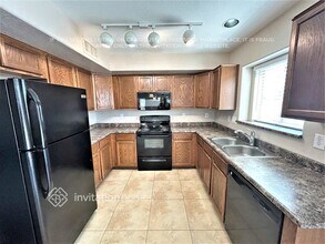 16585 W Latham St in Goodyear, AZ - Foto de edificio - Building Photo