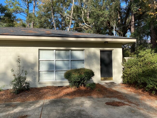 property at 103 E Mills St