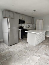 214 NW 57th St-Unit -214 in Oakland Park, FL - Building Photo - Building Photo