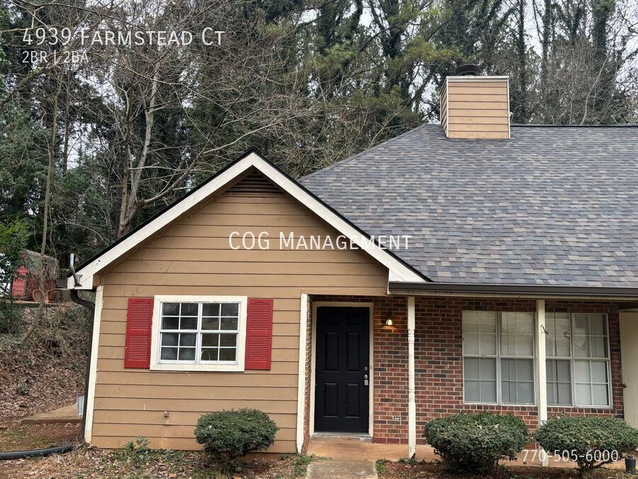 4939 Farmstead Ct NE in Woodstock, GA - Building Photo