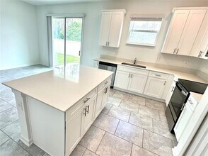 7665 Stone Crk Trl in Kissimmee, FL - Building Photo - Building Photo