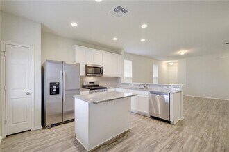434 Eves Necklace Dr. in Mustang Ridge, TX - Building Photo - Building Photo