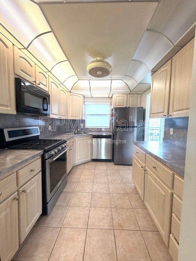 property at 6020 Shore Blvd S