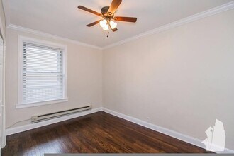 732 W Roscoe St, Unit 2W in Chicago, IL - Building Photo - Building Photo