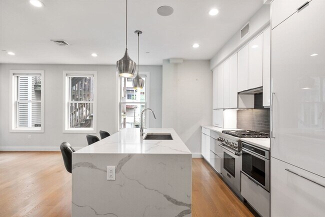 property at 584 E 3rd St