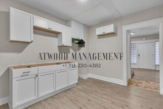 This beautifully updated 3-bedroom, 1-bath single-family home is ready for move-in! in Highland Park, MI - Building Photo - Building Photo