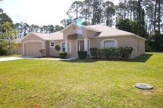 32 Ryding Ln in Palm Coast, FL - Building Photo - Building Photo
