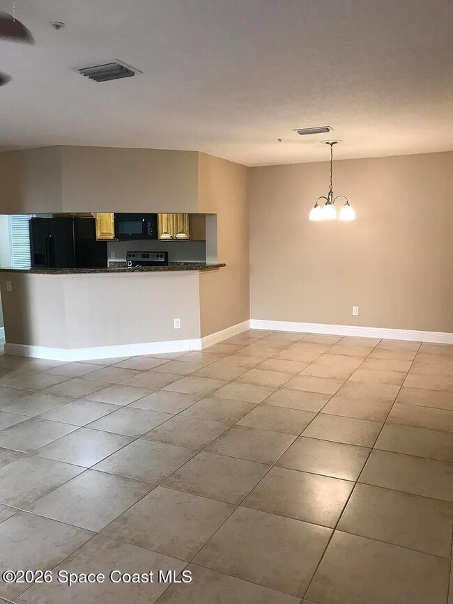 7667 N Wickham Rd in Melbourne, FL - Building Photo - Building Photo