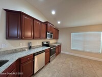 1357 Alaqua Way, Unit 53K-2 in Melbourne, FL - Foto de edificio - Building Photo