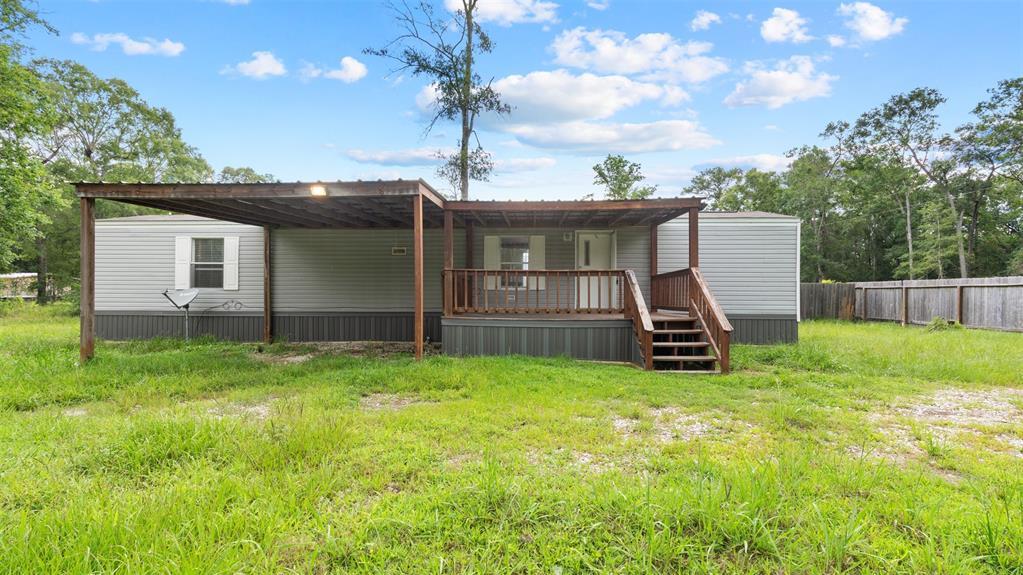 91 Maple Ln in Shepherd, TX - Building Photo