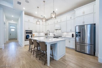 9445 Caymas Ter in Naples, FL - Building Photo - Building Photo