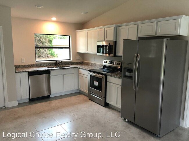 971 Roseway Terrace NW in Port Charlotte, FL - Building Photo - Building Photo