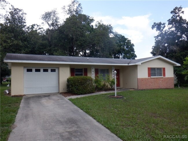 9513 E Village Green Cir in Inverness, FL - Building Photo - Building Photo