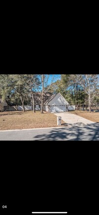 1100 Sean Ln in Niceville, FL - Foto de edificio - Building Photo