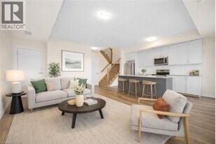 1565 Rose Way in Milton, ON - Building Photo