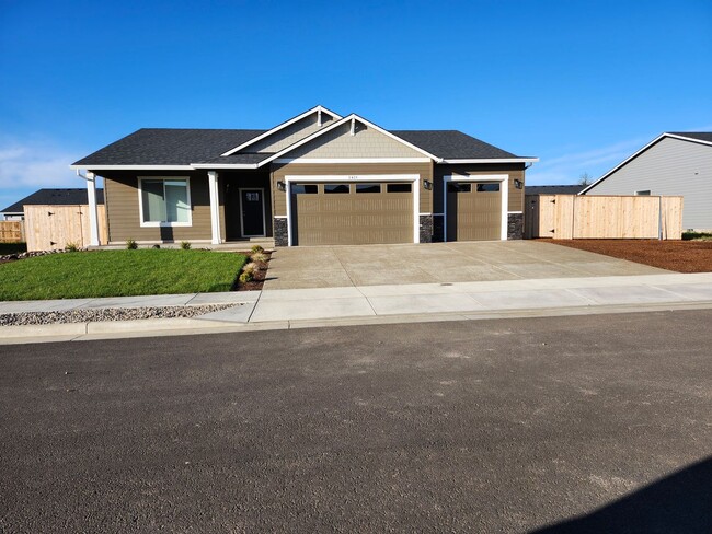 property at 2421 NE Woodland Wy