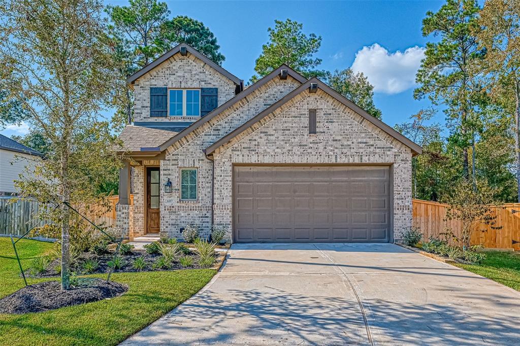 607 Pecan Hickory Ct in Willis, TX - Building Photo
