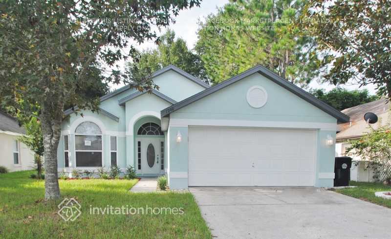 1240 Woodfield Oaks Dr in Apopka, FL - Building Photo